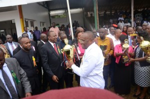 The NSSF Chairman Gideon Ndambuki receiving the number one trophy for the best Government Services